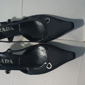 Prada 2 1/2 inch heels with side open and buckle